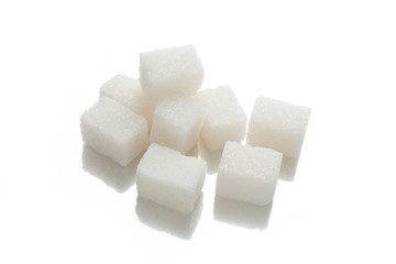 Isolated sweet sugar cubes on white background.