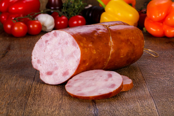 Pork sausages over wooden