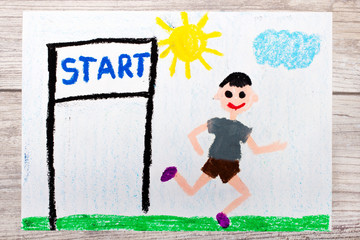 Photo of colorful drawing: boy starting the run. Inscription START and smiling, running boy
