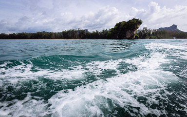 Waves behind a boat