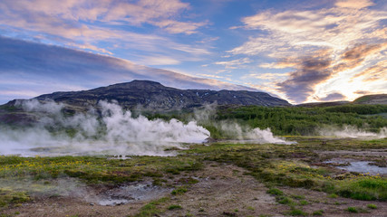 Strokkur geysir in the Golden Circle area of Iceland, which sprouts water 30 metres into the air every few minutes.