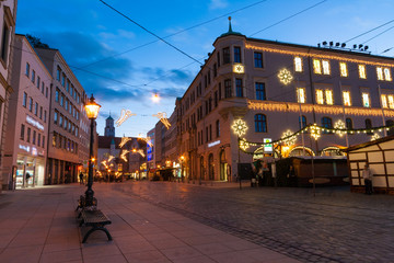 Karolinenstrasse in Augsburg, Germany, during the blue hour in winter