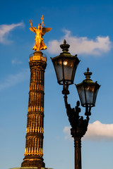 Fototapeta na wymiar The Victory column in Berlin, Germany at sunset