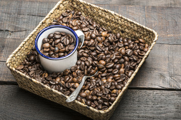 Roasted coffee beans inside a basket