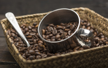 Roasted coffee beans inside a basket