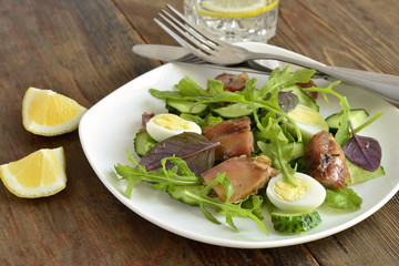 Chicken and vegetable salad with quail eggs