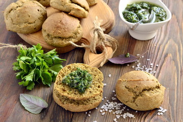Small rye buns with oil with herbs