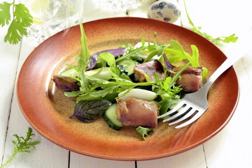 Chicken and vegetable salad with quail eggs
