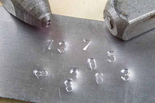 Metal stamps for stamping numbers and letters in metal. Embossed digits in metal.