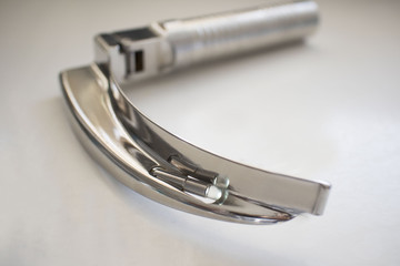 Laryngoscope in hospital operating room, on the medical table