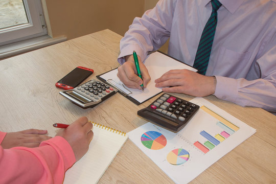 Internal Revenue Service inspectors checking financial document. Planning budget