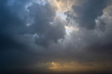 Dramatic dark cumulus evening clouds
