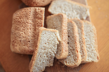 slices of home bread on a wooden cutting board