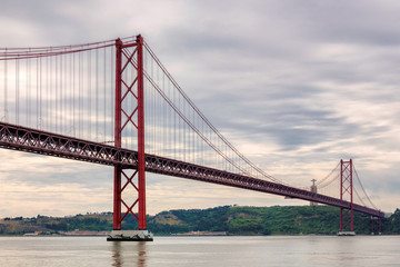 Fototapeta na wymiar The 25 April bridge (Ponte 25 de Abril), Lisbon, Portugal.