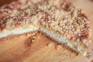 homemade cheesecake on a wooden cutting board