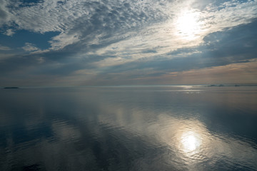 beautiful morning sun over the ocean seen from a cruise ship