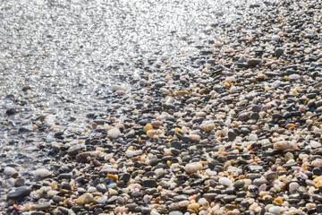 Sea stones on the seashore in the summer