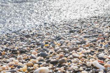 Sea stones on the seashore in the summer