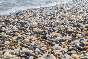 Sea stones on the seashore in the summer