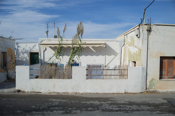Fototapeta na wymiar Typical Houses off Tourist Trail, Santorini, Cyclades, Greece