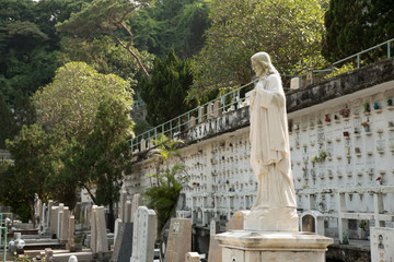 Cemetery in Hong Kong downtown on sunny day