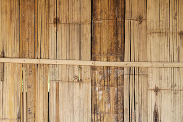 Abstract stripes pattern of bamboo wall.