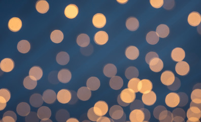 Blur background and bokeh of light bulbs on twilight sky.