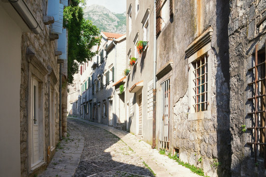 Beautiful cobblestone street. Montenegro, town of Risan, Gabela street