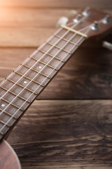Ukulele guitar on table wood