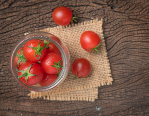 Mini tomatoes,cherry tomatoes on wood