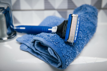 Blue razor in the toilet 