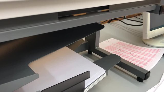 Optical Mark Reader scanning a multi-choice exam