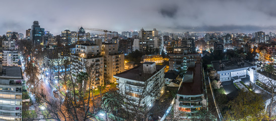 Santiago de Chile at night time with the light movements coming from everywhere giving a new view of the city, plating with photography