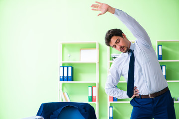 Employee doing exercises during break at work