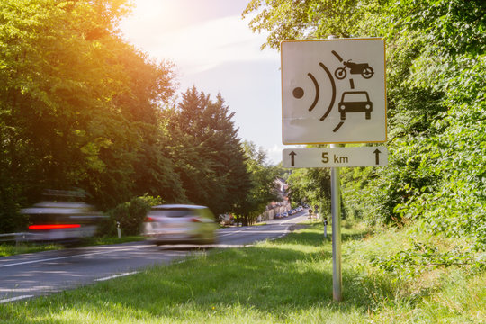 Speed Limit Speed Camera Sign Close To The Road