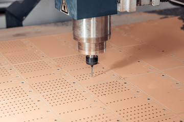 Work on a CNC machine. Closeup of a spindle at high speed.