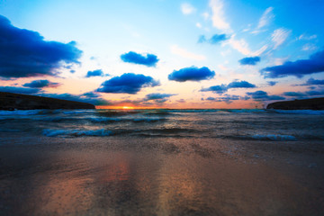 Sea beach and on sunset sky