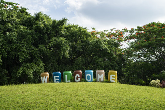 Welcome image of green garden background in the park