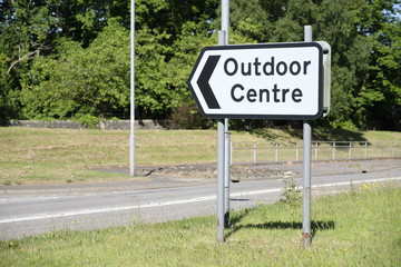 Outdoor centre road sign direction information