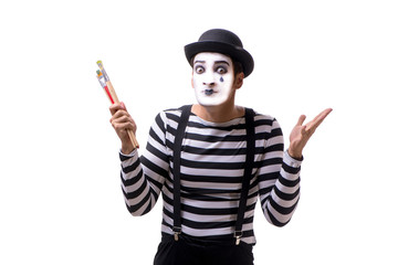Mime holding brushes isolated on white background 