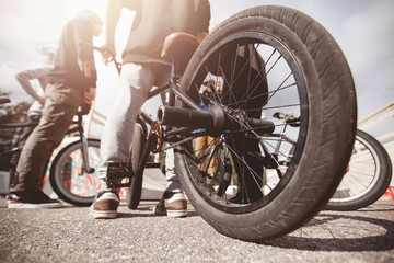 Guy is riding bmx bike. Concept extreme teenagers. Sunset