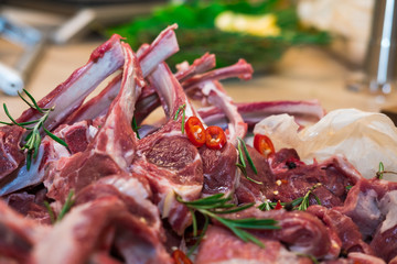 Fresh lamb saddle on the bone, meat with streaks of fat