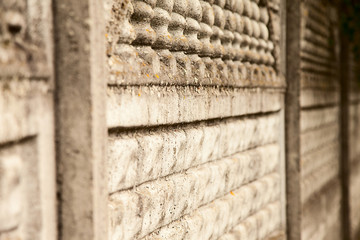 old vintage light stone fence, view along the fence