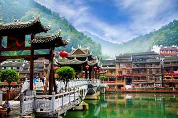 HUNAN, CHINA - JUNE 16, 2014 : Old houses in Fenghuang county in Hunan, China. The ancient town of...
