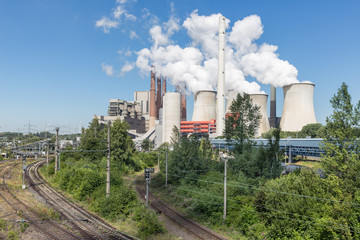 Coal-fired power plant with railroad tracks near Garzweiler open pit mine in Germany