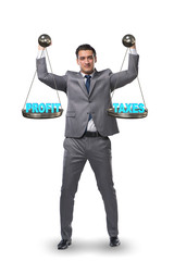 Businessman comparing profit and taxes