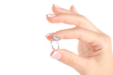 Silver white gold ring on hand on white background isolation
