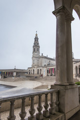 Fototapeta na wymiar The Sanctuary of Fatima. Square and Basilica of Our Lady of Fatima during the bad weather