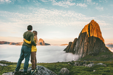 Couple hugging enjoying mountains landscape family traveling together healthy lifestyle concept...