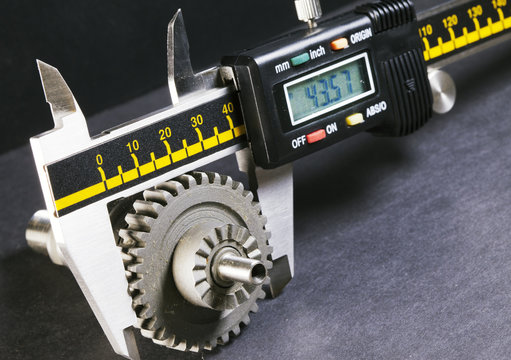 measurement  parameters of gears, details by digital micrometer..